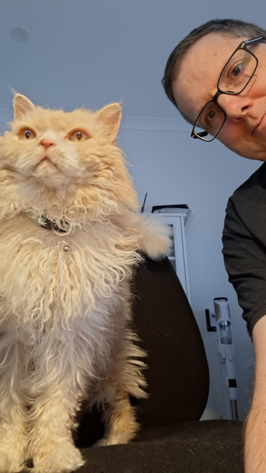 Ted on his office chair